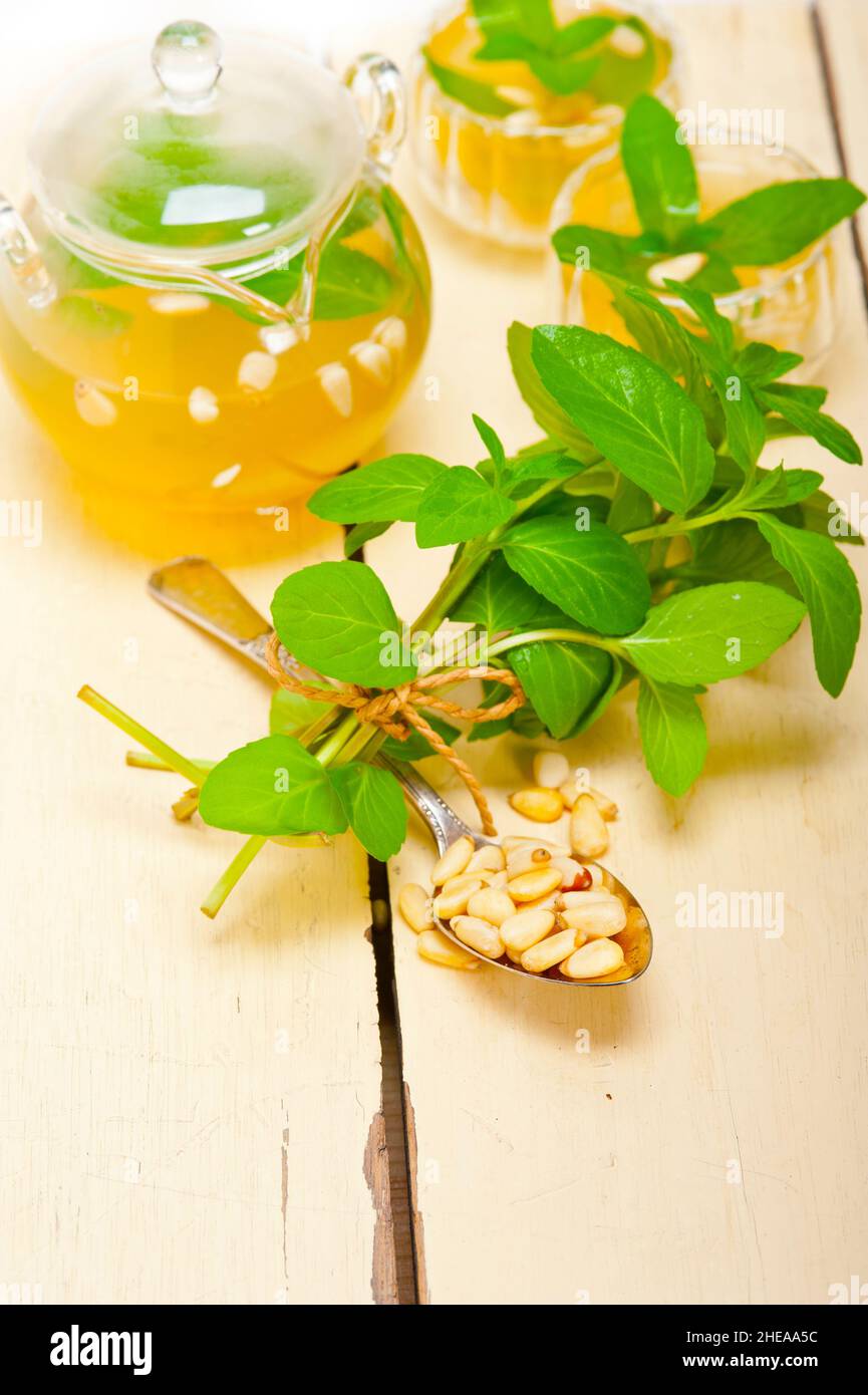 Arab traditional style mint and pine nuts tea called at tay Stock Photo ...
