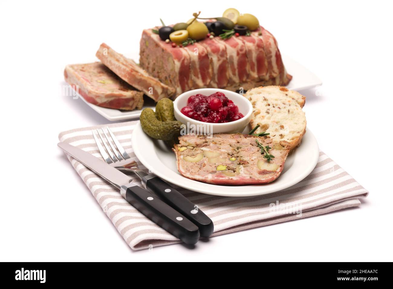 Portion of Traditional French terrine covered with bacon isolated on