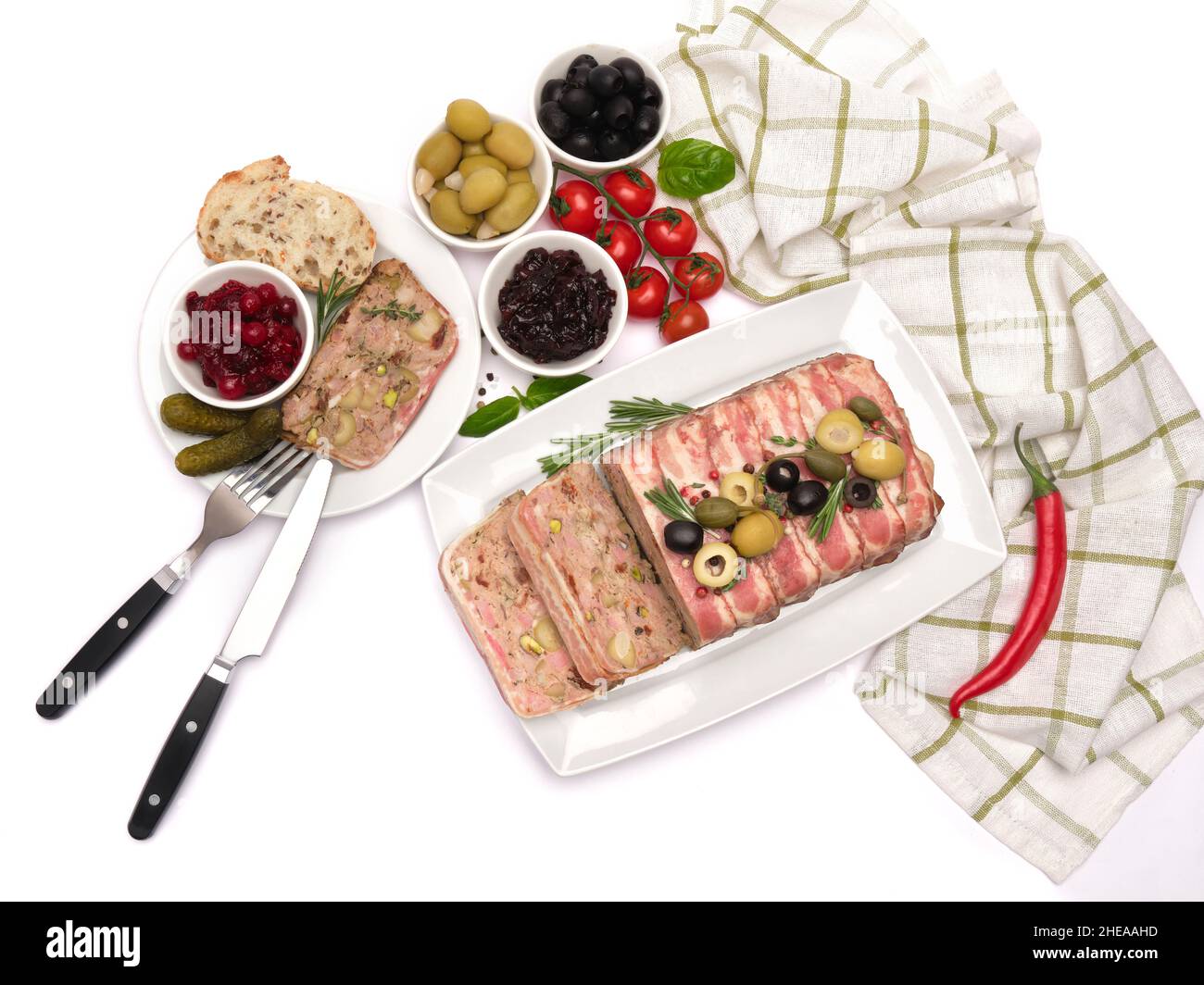 Traditional French terrine covered with bacon isolated on white