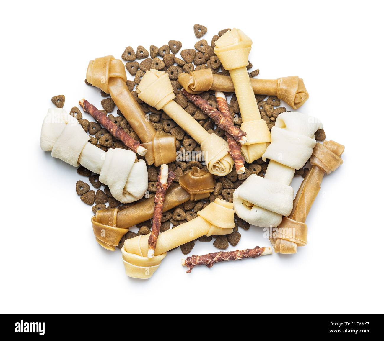 Delicacy for dogs. Chewing bone and dried food for dog isolated on