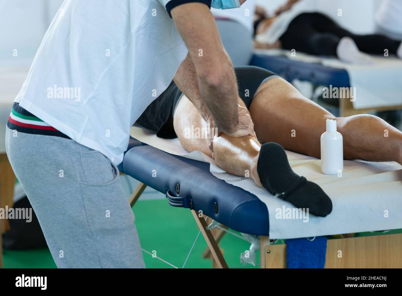 Athlete's Calf Muscle Professional Massage Treatment after Sport