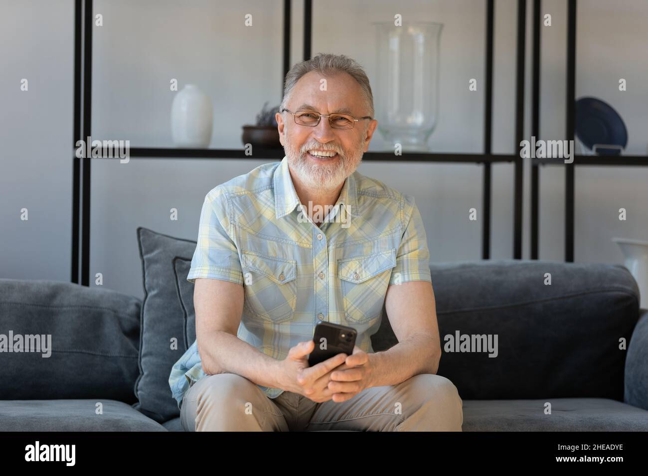 Portrait of smiling old man hi-res stock photography and images - Alamy
