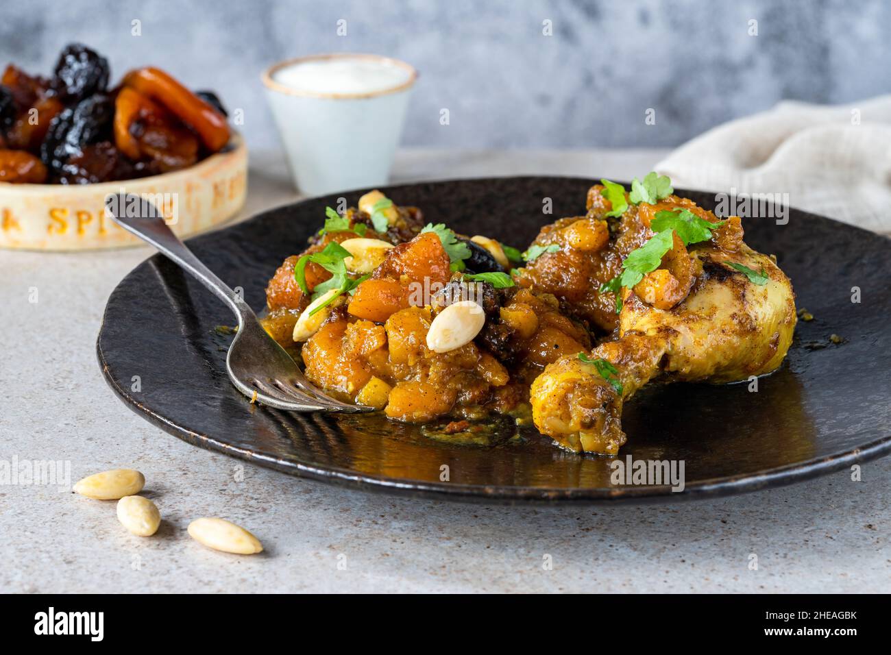 Chicken leg tagine with caramelised prunes and apricots and roasted