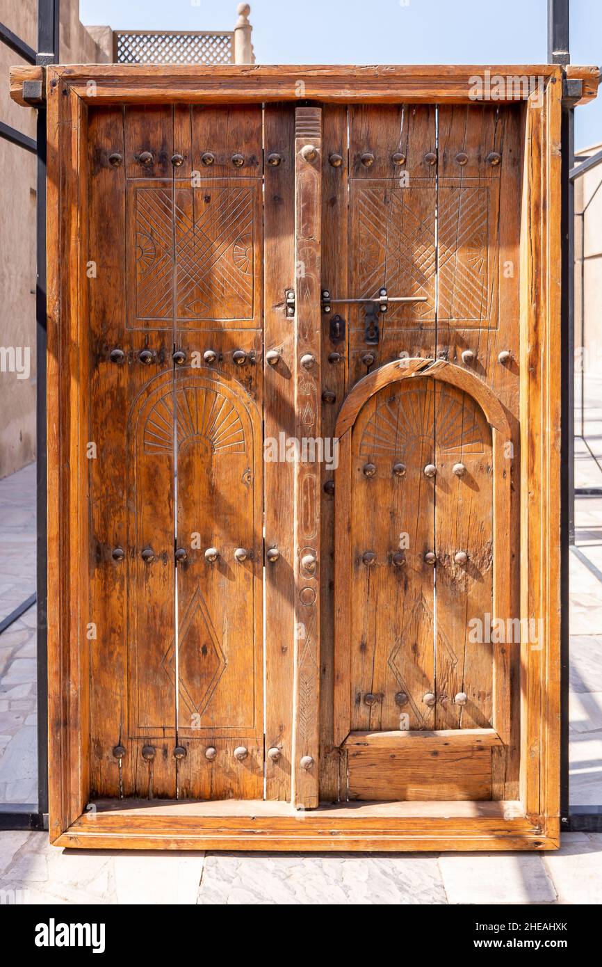 Traditional islamic wooden carved doors of Al Shindagha Historic Neighborhood, Al Fahidi, Dubai, UAE. Stock Photo