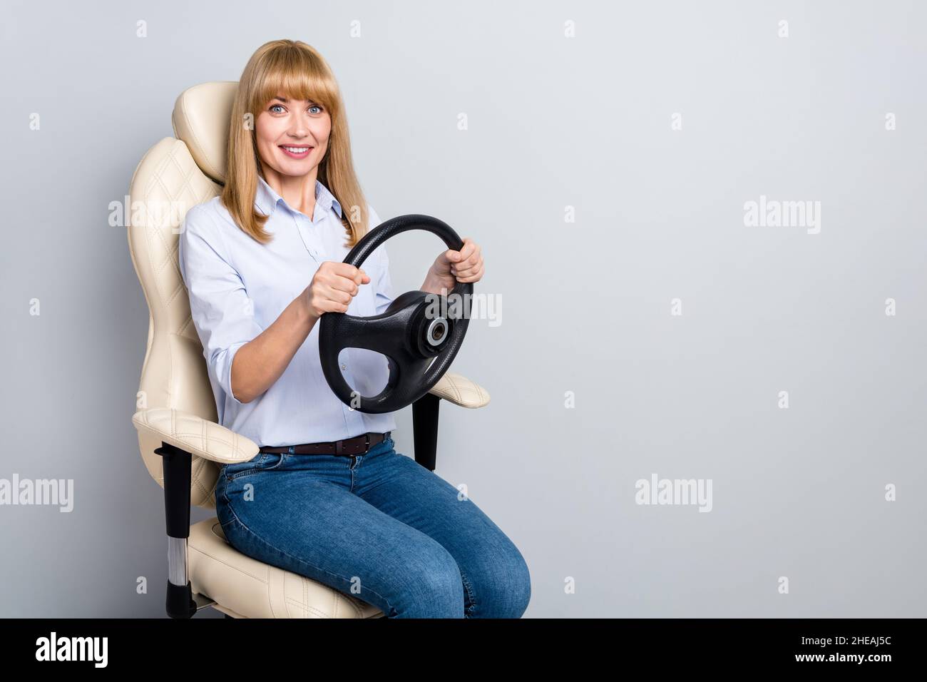 Photo of cute sweet woman wear formal shirt sitting armchair riding
