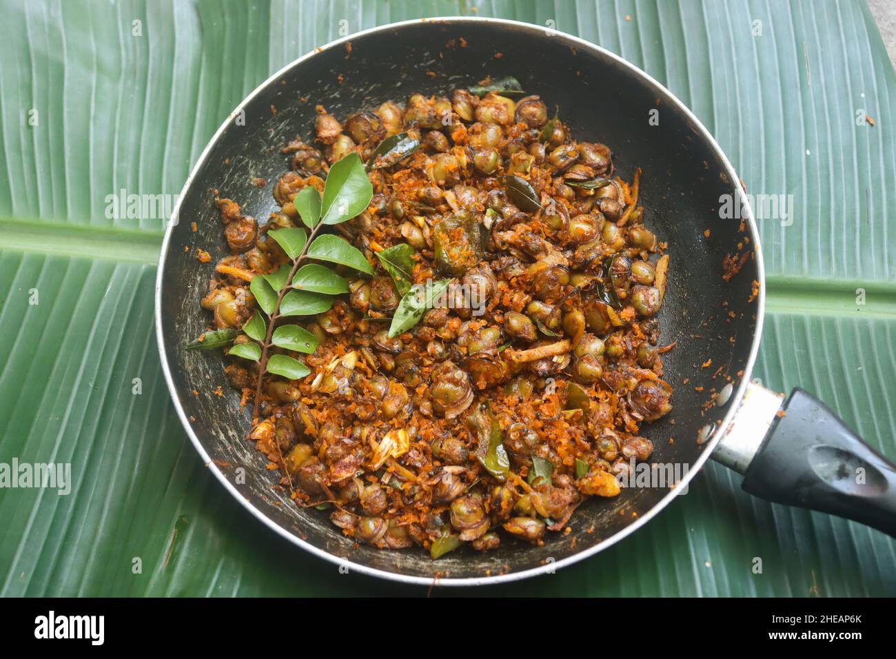 Clam meat fry kerala style kakka irachi fry Stock Photo Alamy