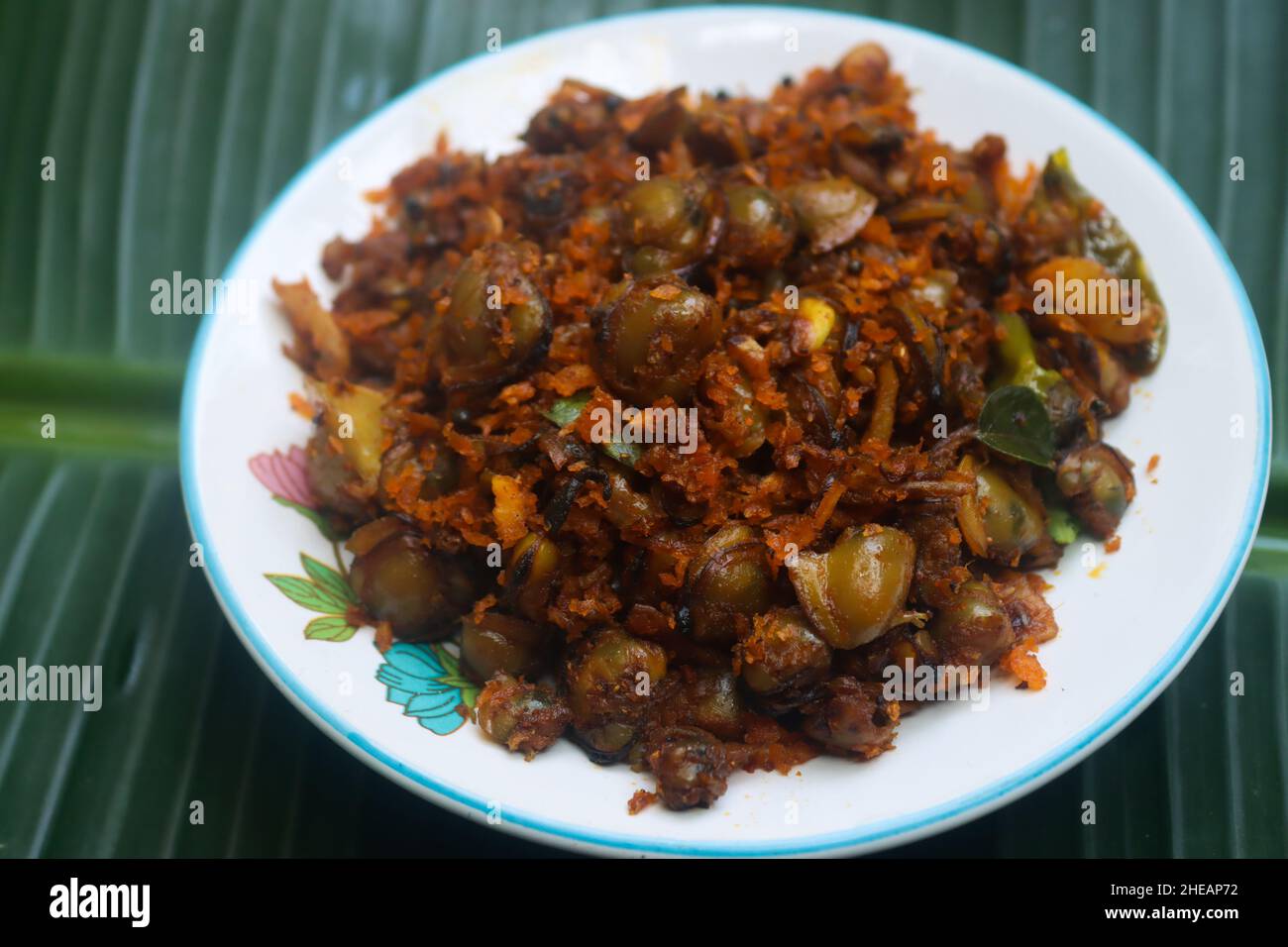 Clam meat fry kerala style kakka irachi fry Stock Photo Alamy