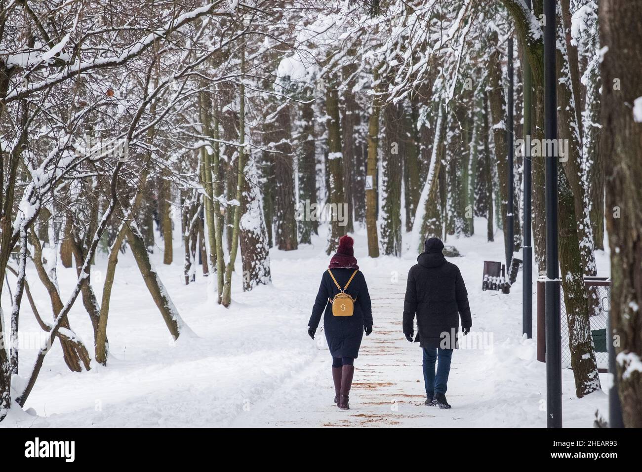 White woman walks through road hi-res stock photography and images - Alamy