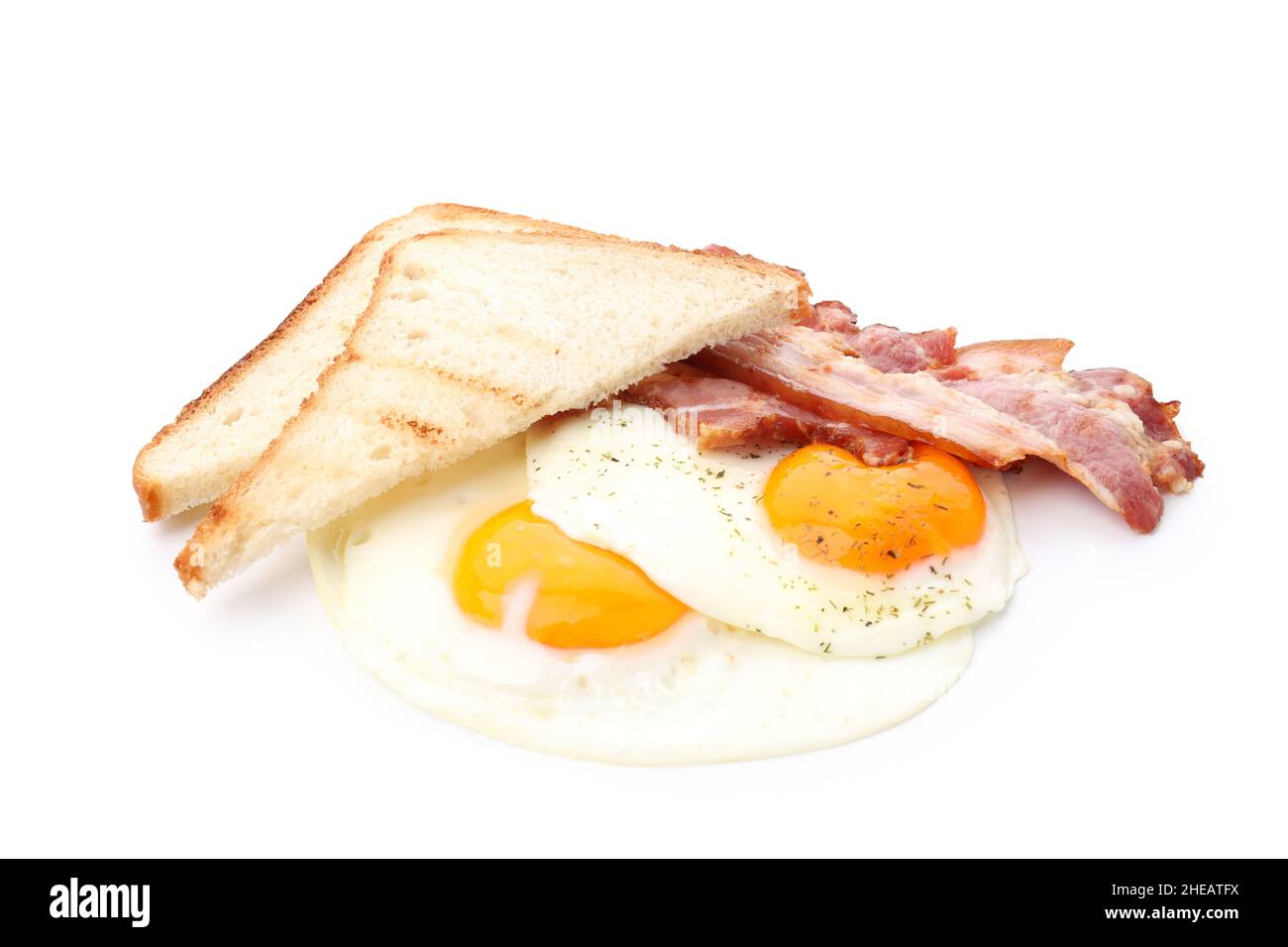 Fried eggs, bacon and toasts isolated on white background Stock Photo ...