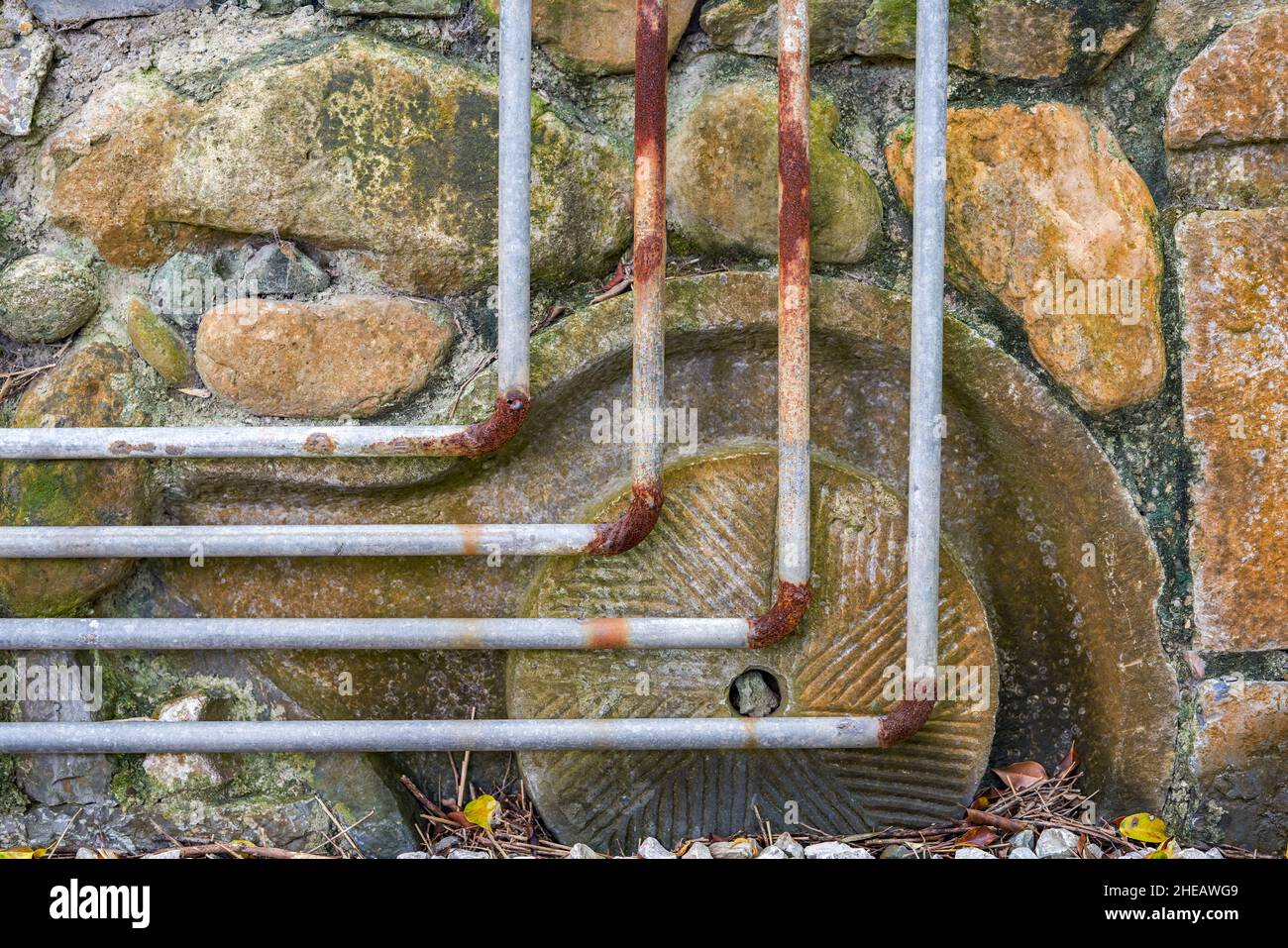 Old and rusty water pipes and pipe joints on stone wall Stock Photo Alamy