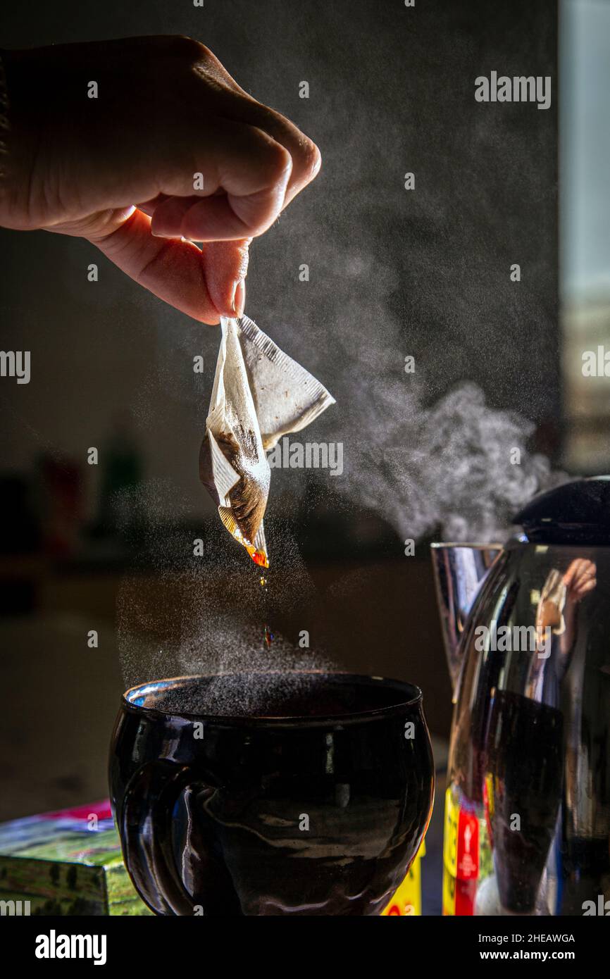 Steps to Make Tea,Boil water. Different types of tea require different water temperature to brew. Put tea bag into cup and add hot water.Perfect Cup Stock Photo