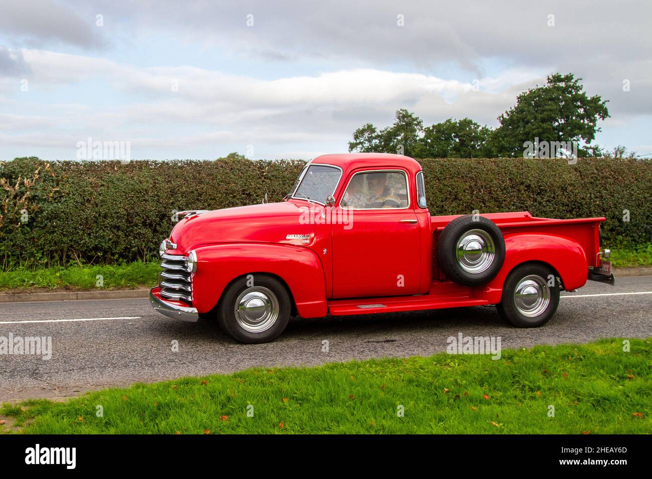 1953 50s Chevrolet GMC 4998cc en-route to Capesthorne Hall classic car show, Cheshire, UK Stock Photo