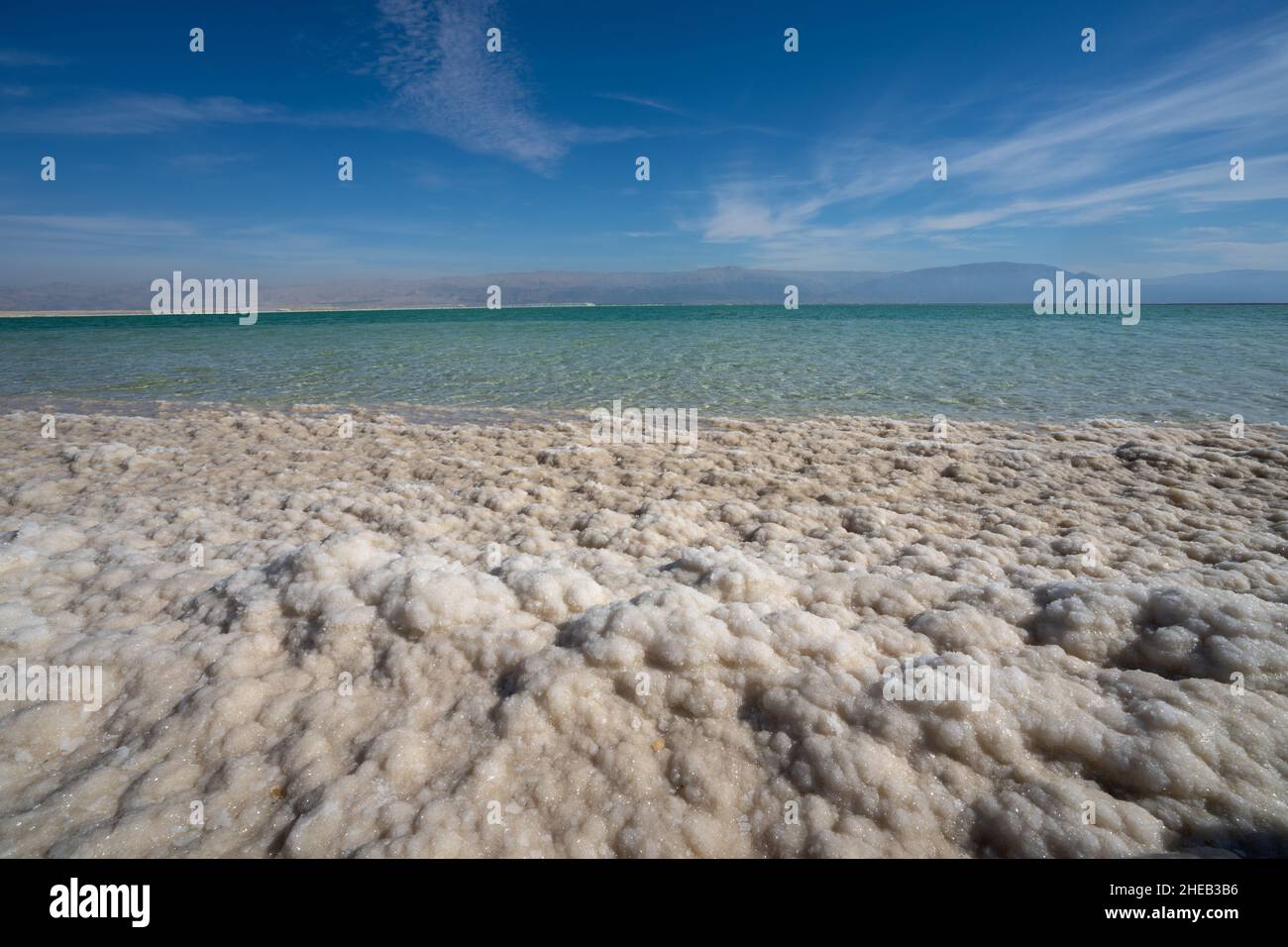 water level receding and salt crystallization due to evaporation on the