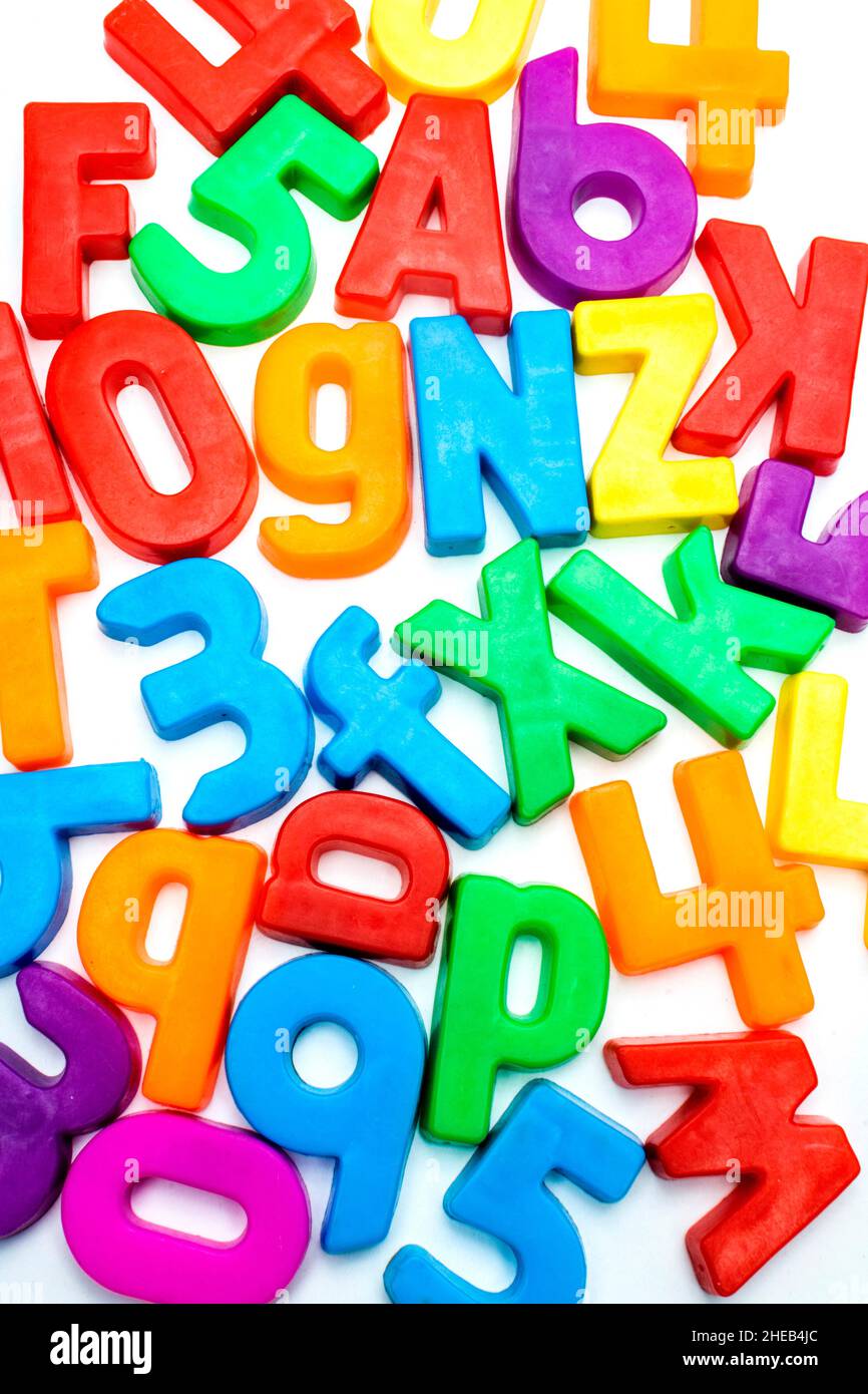 Multicolored letters and numbers on white background Stock Photo