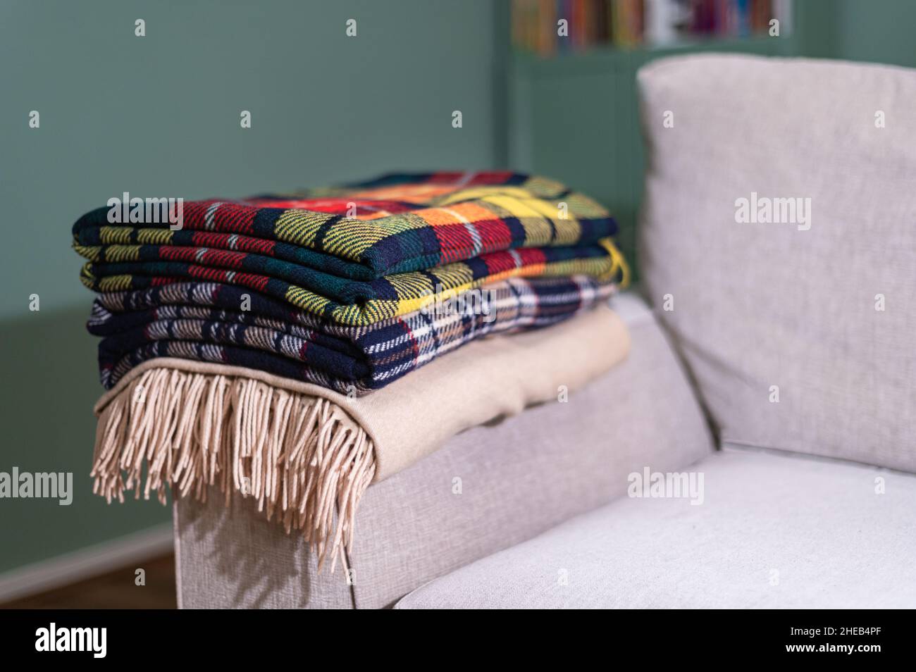 Stack of woolen checked blankets Stock Photo
