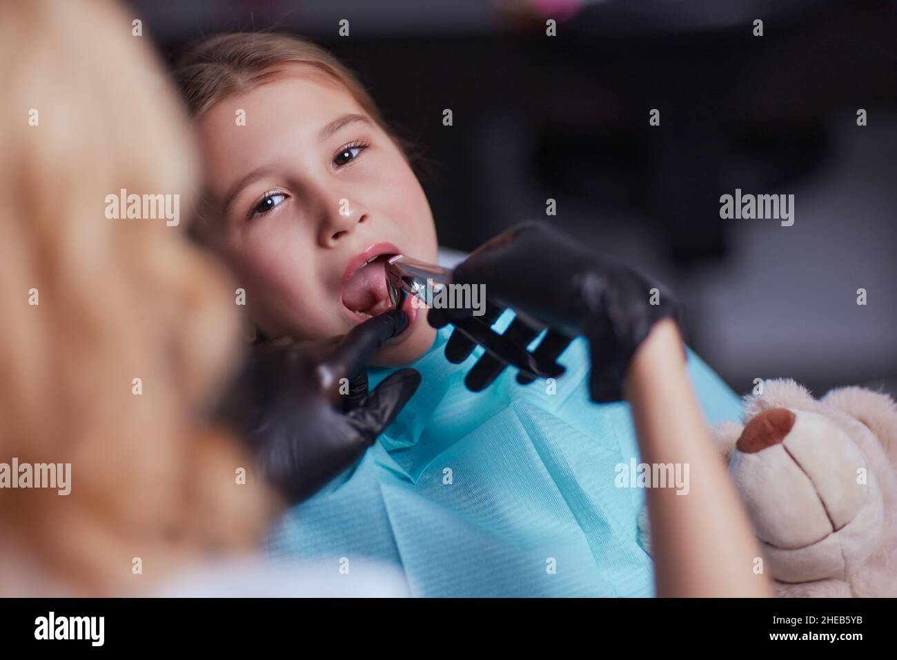 Dentist use anesthetic injection for tooth extraction in child Stock Photo Alamy