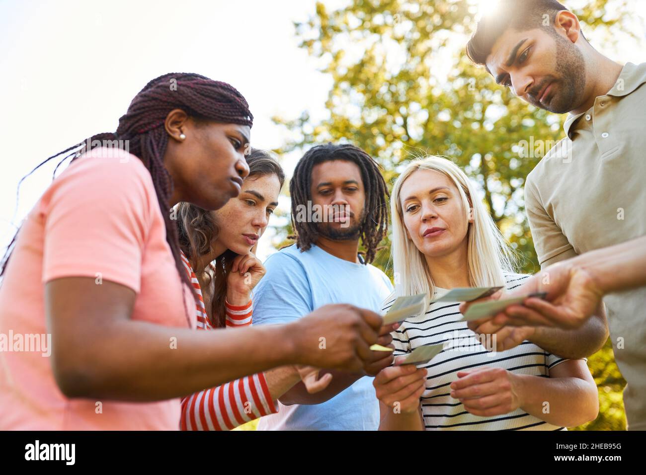 Start-up team people brainstorming in a team building workshop in nature Stock Photo