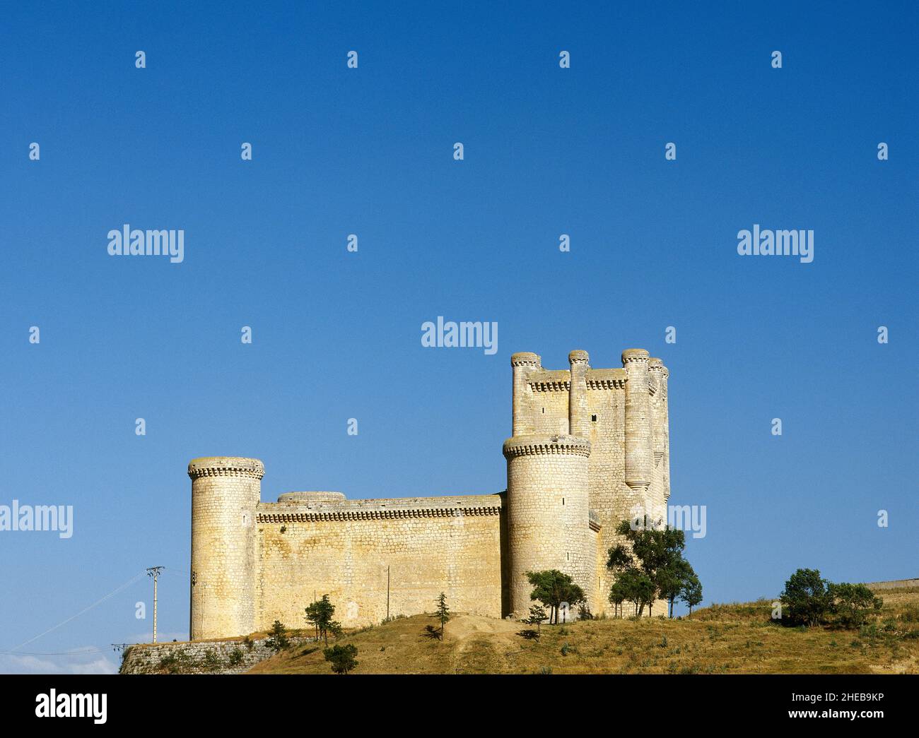 Spain, Castile and Leon, Valladolid province, Torrelobaton Castle. Built in the first quarter of the 15th century by Enríquez family. With a square ground-plan, it has cylindrical towers at the corners and a large homage tower. It was renovated after damage suffered during the War of the Communities of Castile in 1538. General view. Stock Photo