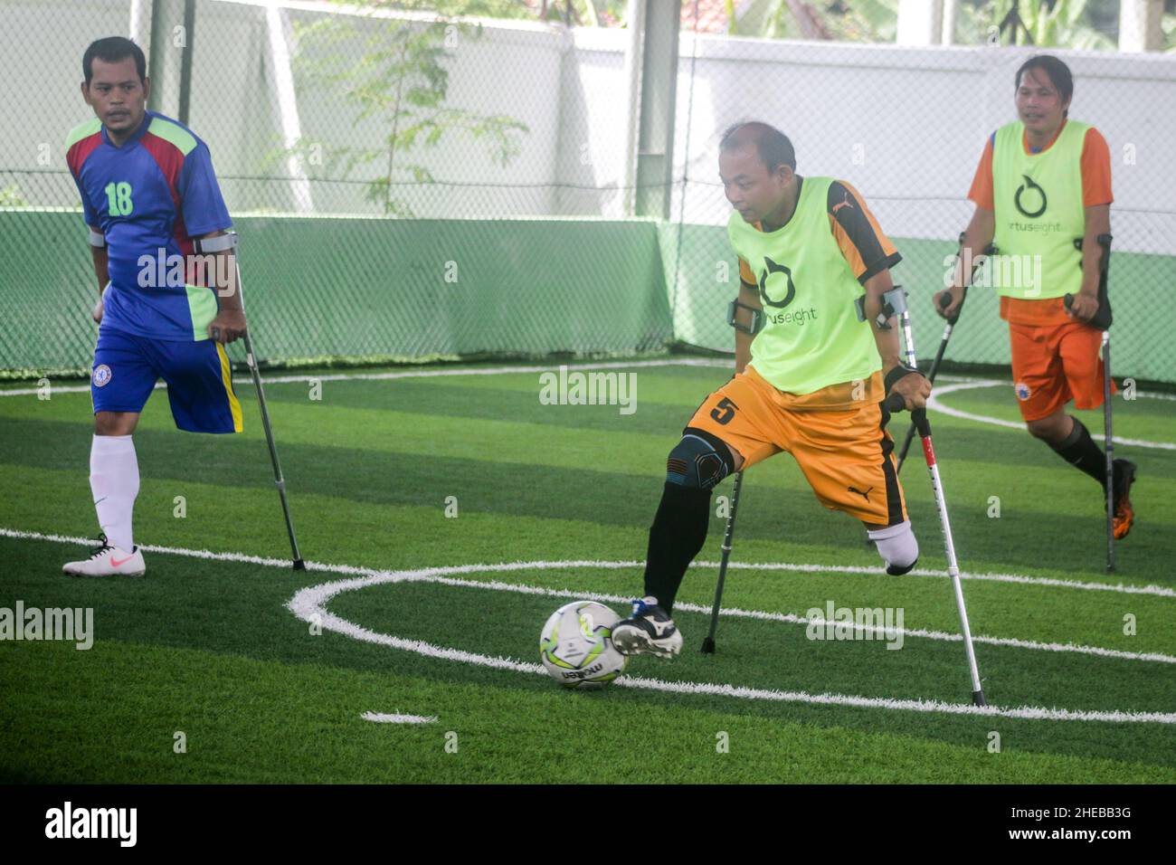 BOGOR, INDONESIA - January 09, 2022: Amputee Football Team training session in Bogor, Indonesia, on January 09, 2022 Stock Photo