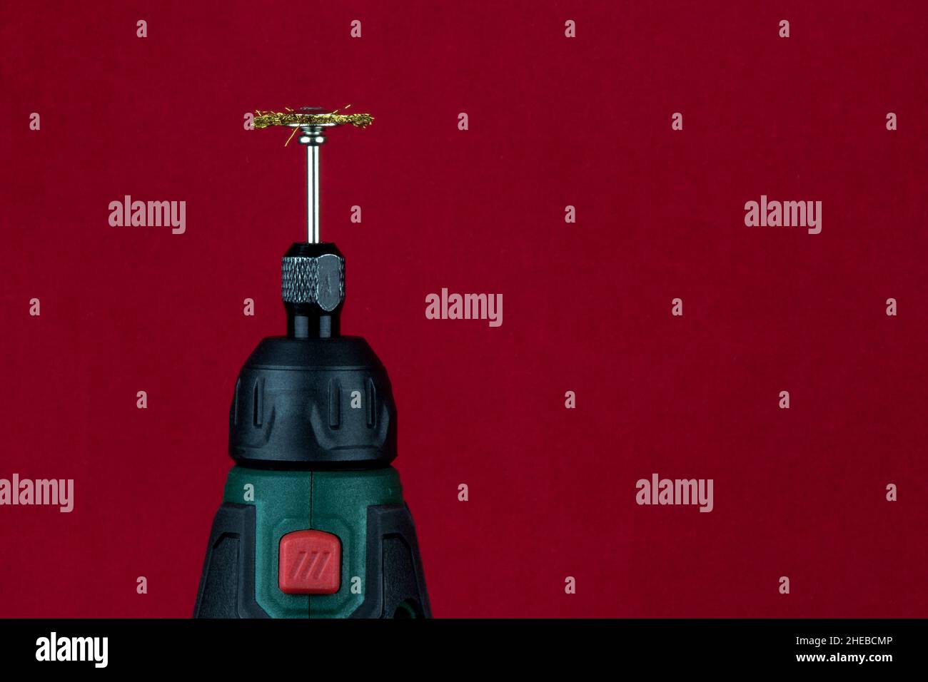 Rotary hand tool isolated on a red background Stock Photo Alamy