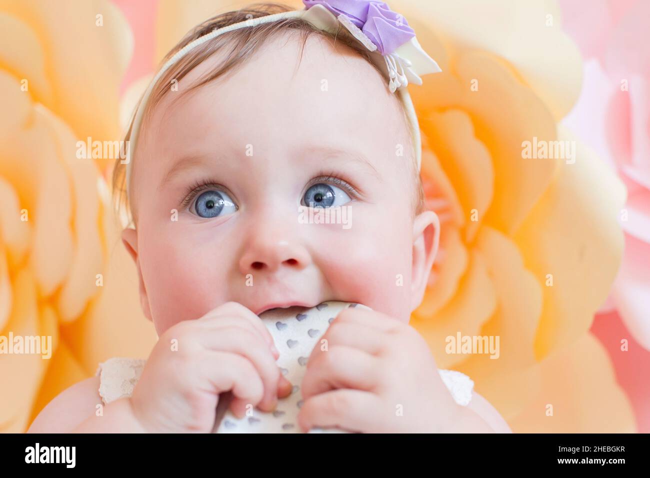 Oneyearold girls with blue eyes closeup Stock Photo Alamy