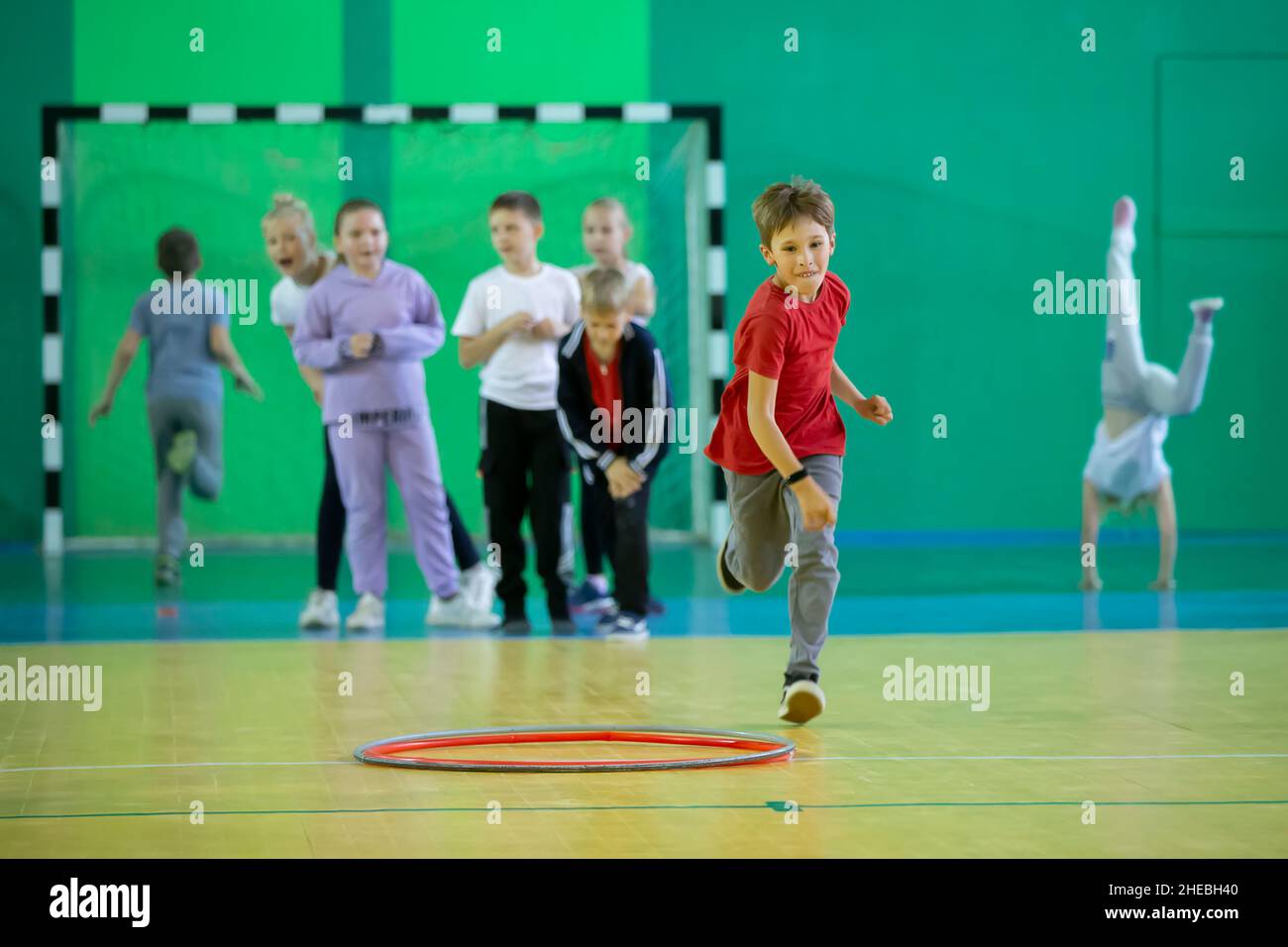 Open physical education lesson. The boy participates in a sports day
