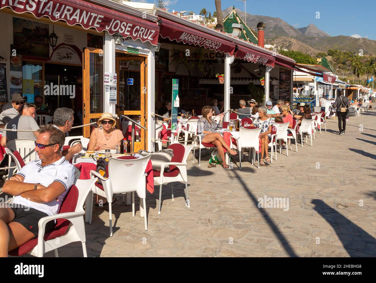Seafood fish and paella beach restaurant, Playa de Burriana, Nerja, Andalusia, Spain Stock Photo