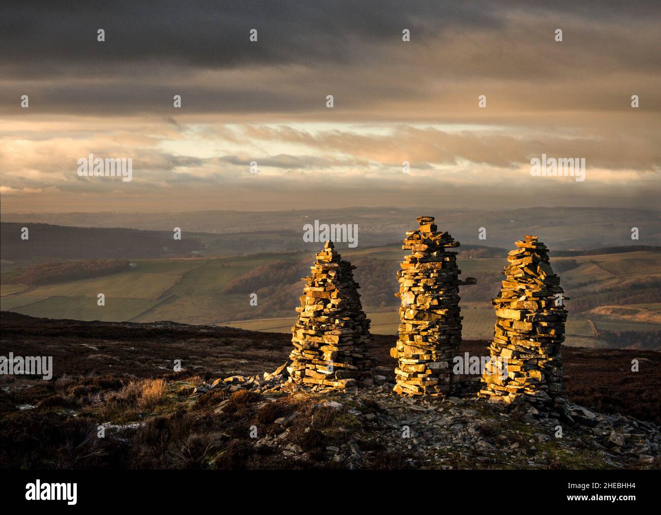Three Stone Men on Grit Fell above Quernmotre in The Forest of Bowland in Lancashire Stock Photo