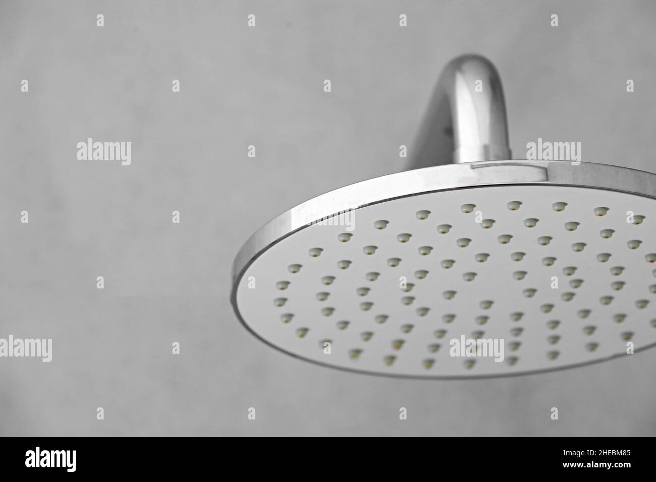 Dirty calcified shower mixer tap, faucet with limescale on it, plaque