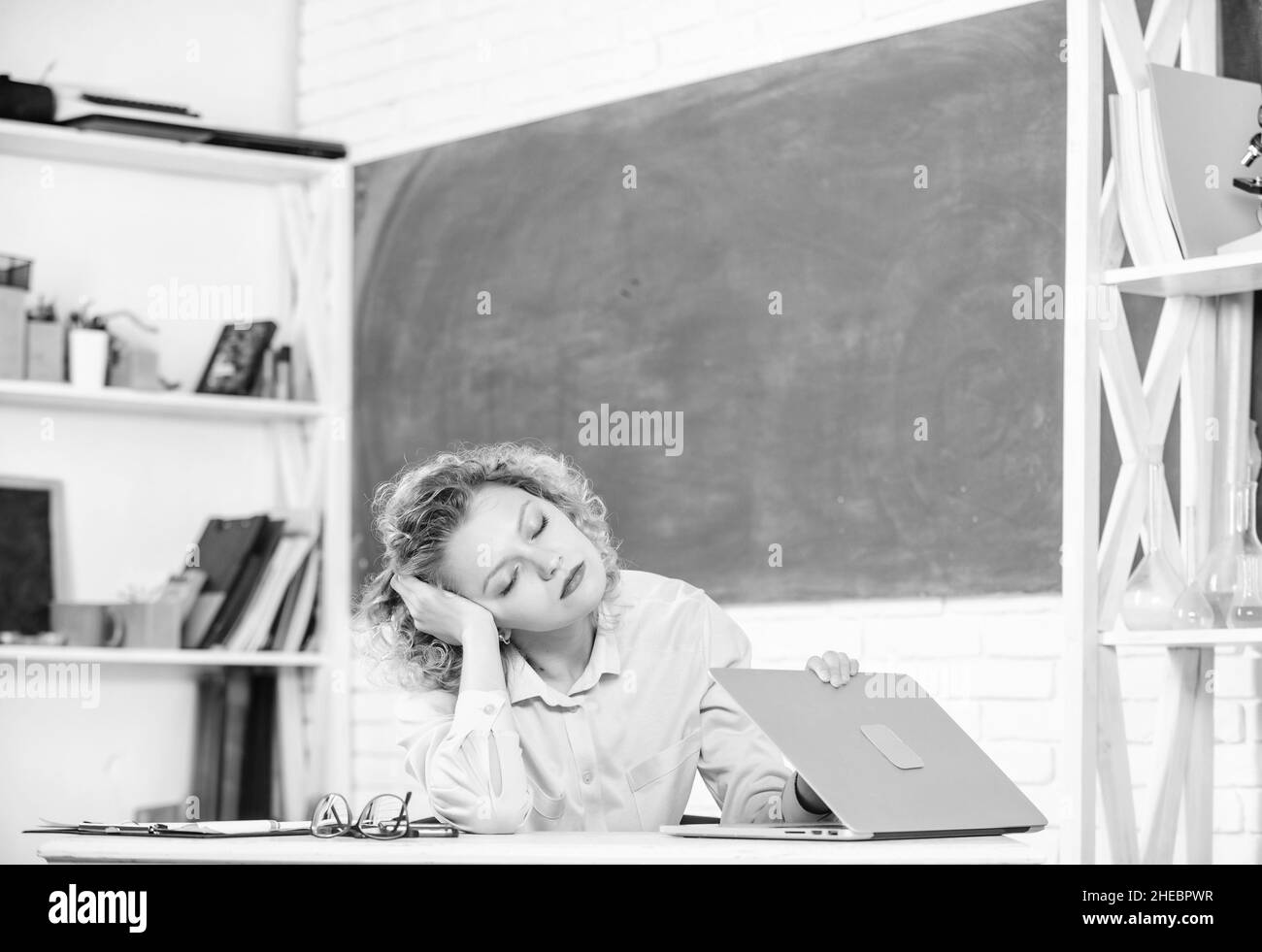 Exhausting lesson. Tired tutor fall asleep at workplace. Woman tired in