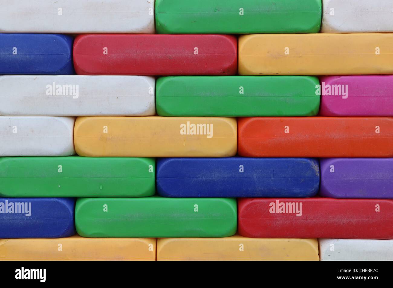 Wall of multi colored plastic toy blocks Stock Photo