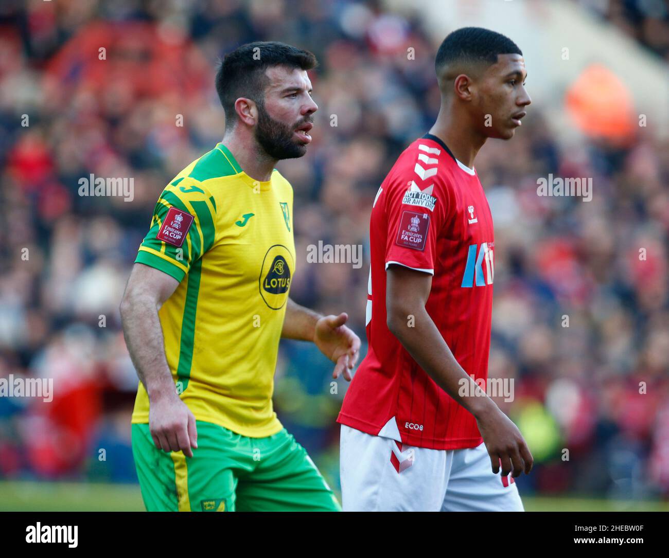 LONDON, United Kingdom, JANUARY 09: L-R Grant Hanley of Norwich City  and Charlton Athletic's Mason Burstow during FA Cup Third Round Proper between C Stock Photo