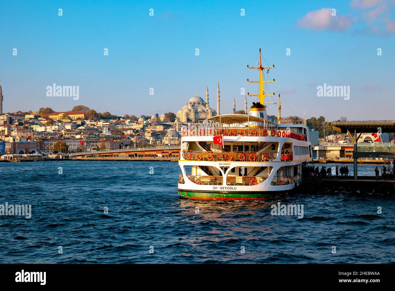 Istanbul and Ferry. A ferry near the Karakoy Pier and Suleymaniye ...