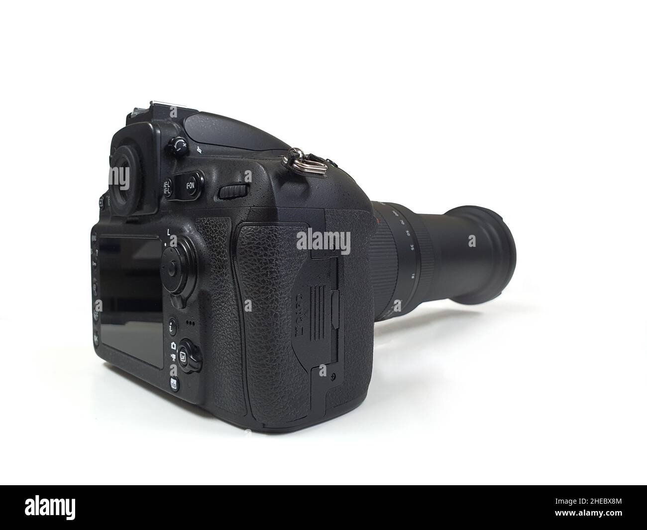 Digital camera with tele lens, professional isolated on white Stock