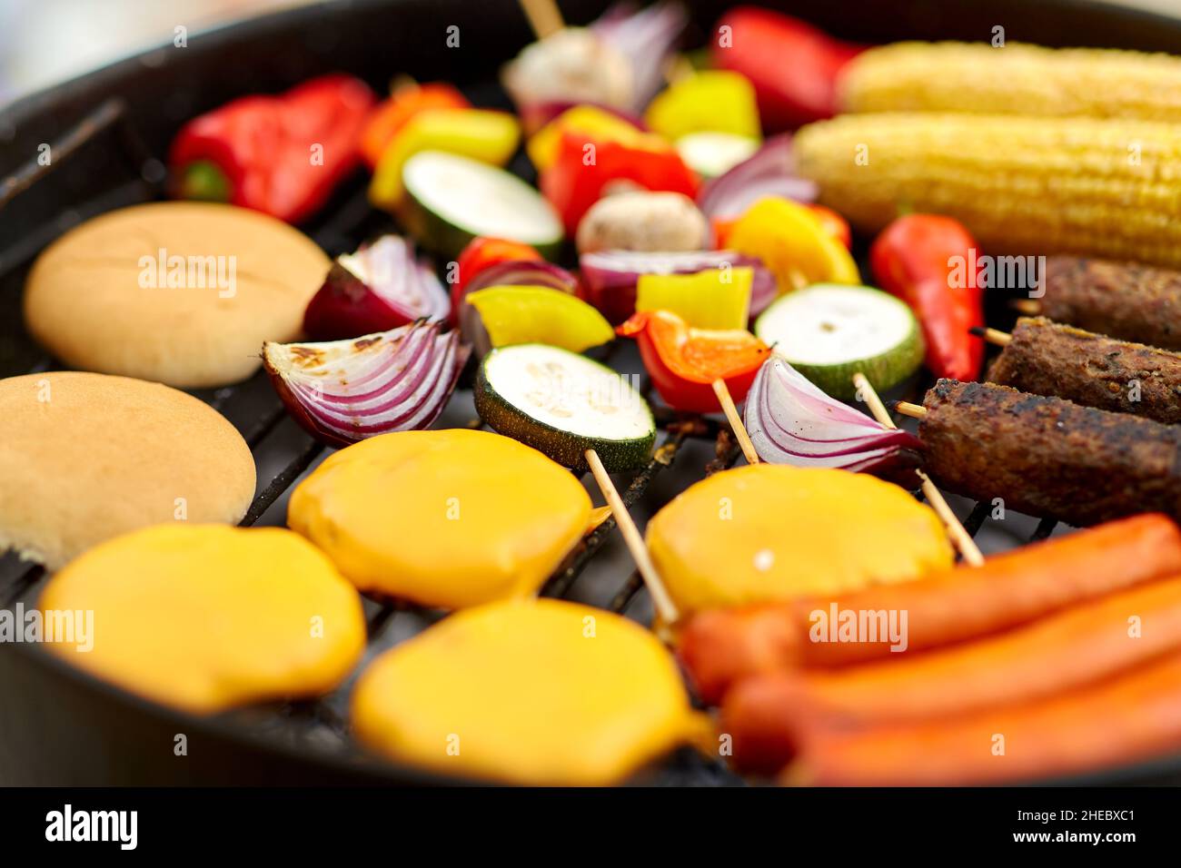 barbecue kebab meat and vegetables on grill Stock Photo
