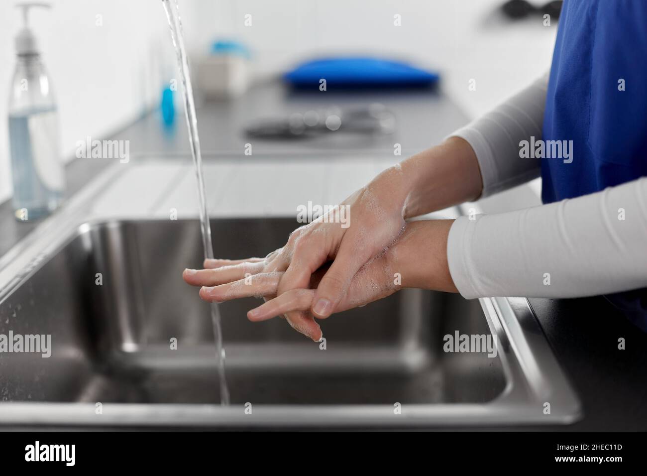 doctor or nurse washing hands with liquid soap Stock Photo - Alamy