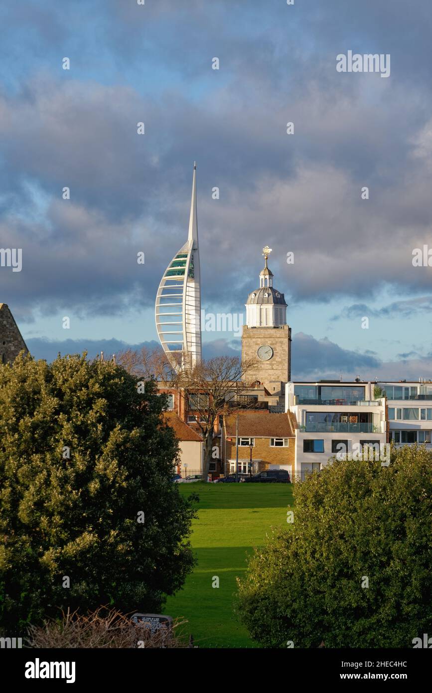 The Spinnaker Tower looming over the skyline of old Portsmouth illuminated by a dramatic winter sunset, Hampshire England UK Stock Photo