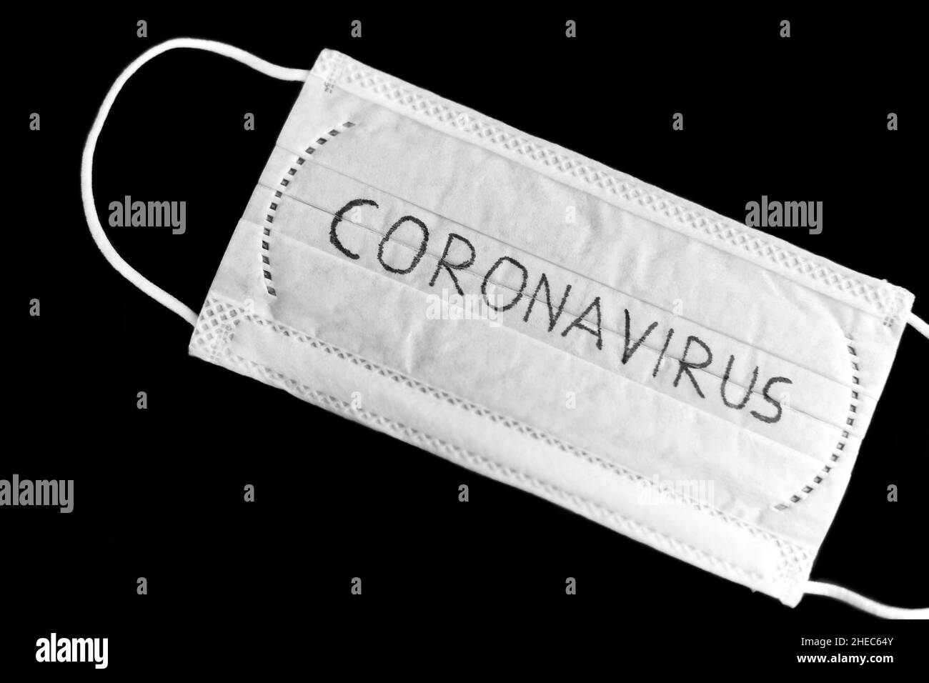 face protective medical mask with coronavirus Stock Photo