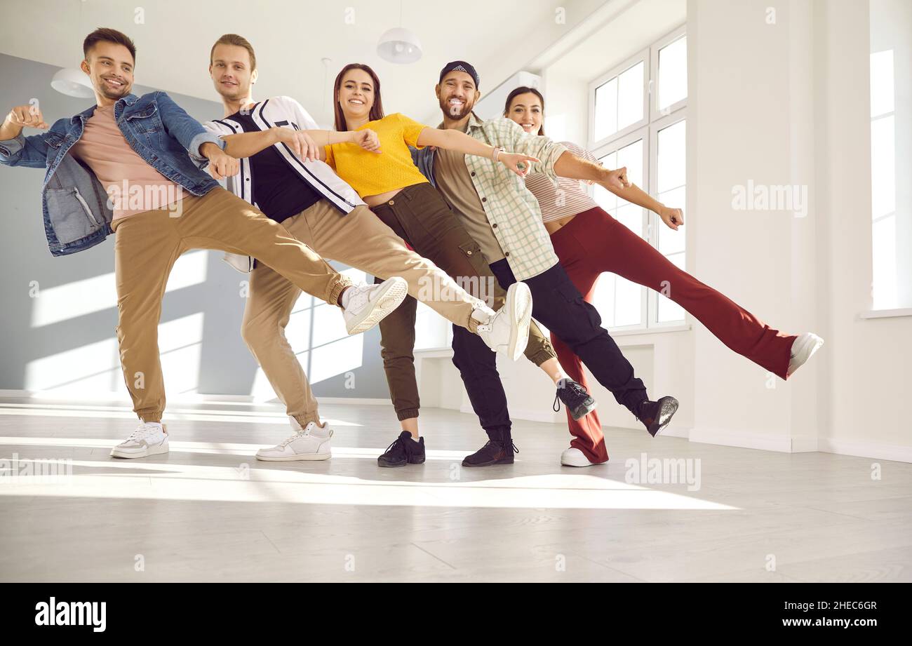Group of happy young dancers and friends having fun together during a dancing class Stock Photo
