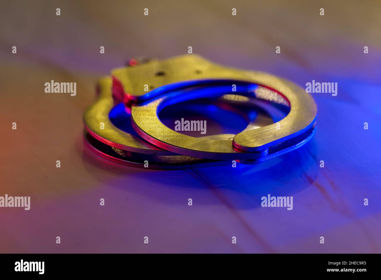 Flashing red and blue police lights of handcuffs police Stock Photo Alamy