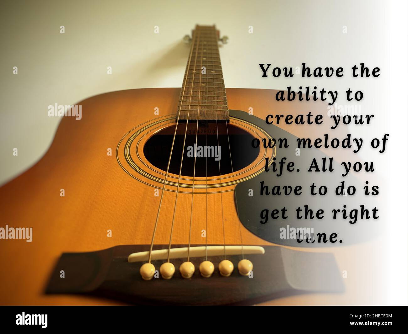 Motivational and inspiration quotes - You have the ability to create your  own melody of life. All you have to do is get the right tune. With guitar  Stock Photo - Alamy