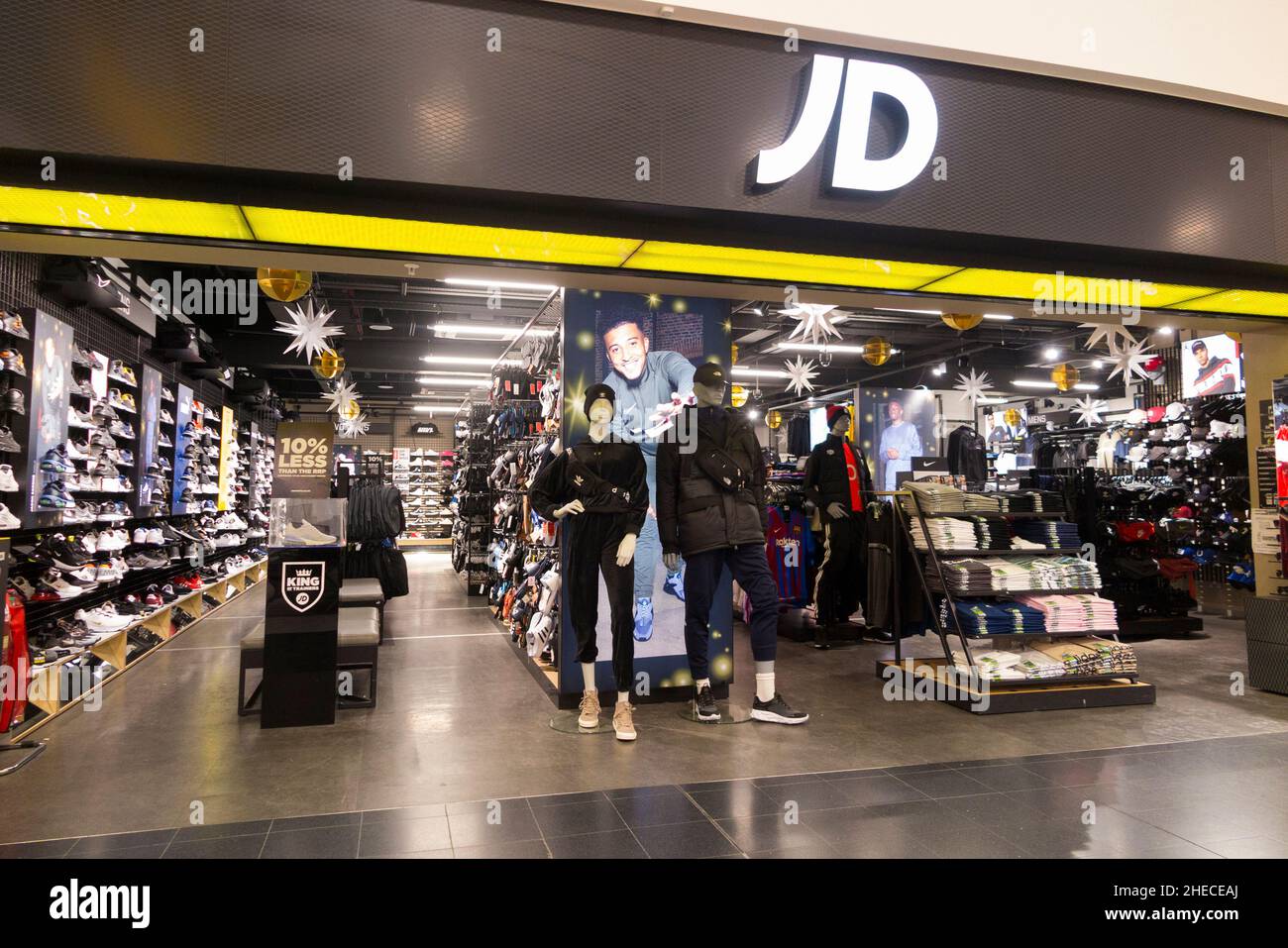 JD Sports shop with open walk in display and sign for the airside retail store at Gatwick airport North Terminal. London. UK. (128) Stock Photo