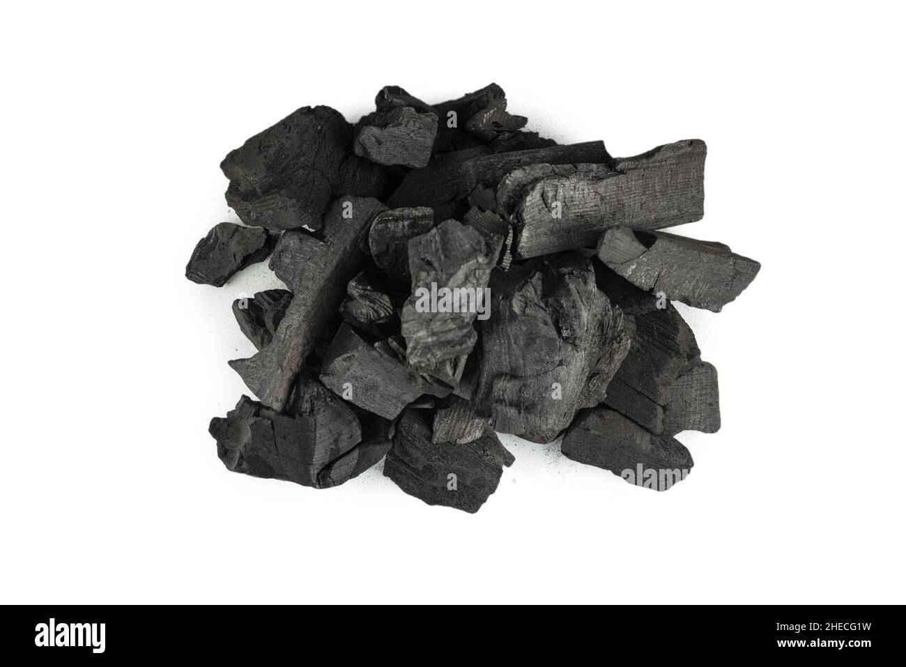 Black oak coal isolated on a white background. Stock Photo