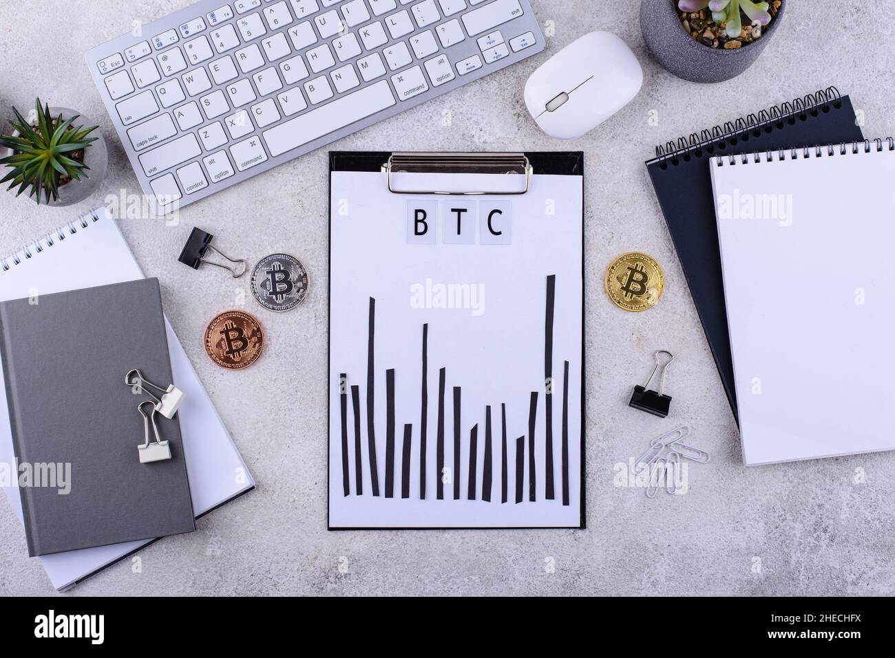 Bitcoin shedule on desk. Cryptocurrency concept Stock Photo