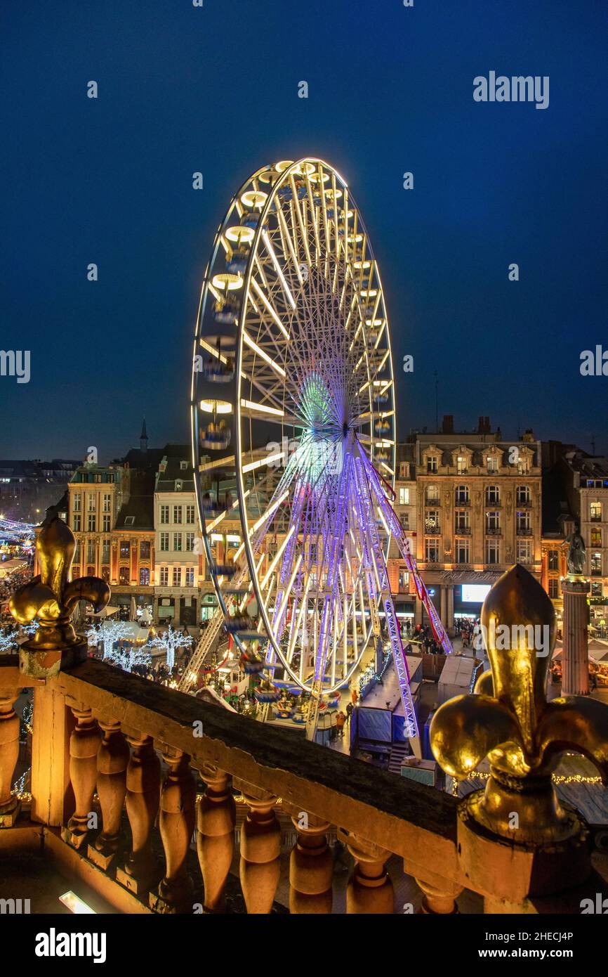 France, Nord, Lille, the Ferris wheel installed during the Christmas season on the Place du General de Gaulle or Grand Place Stock Photo