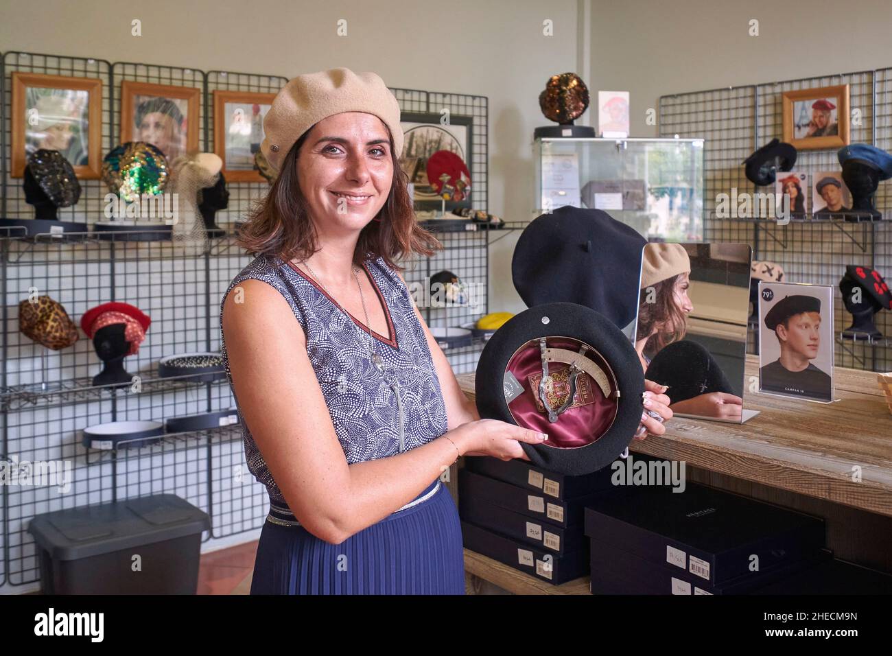 France, Pyrenees Atlantiques, Bearn, Nay, Beret Museum, Che Guevara beret on sale, Nadege Dos Santos, guide and shop manager Stock Photo