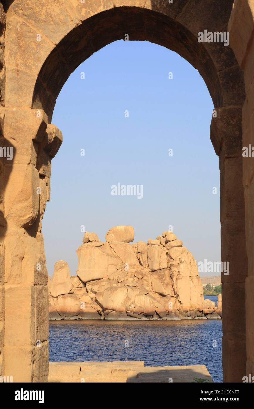 Egypt, Upper Egypt, Nubia, Nile valley, Aswan, Agilka island, view from the Diocletian gate of the temple of Philae (listed as World Heritage by UNESCO) on the surroundings located between the old Aswan dam and the Aswan High Dam Stock Photo