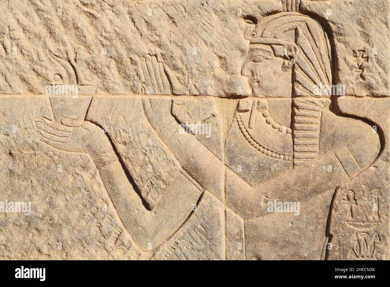 Egypt, Upper Egypt, Nubia, Nile valley, Aswan, Agilka island, temple of Philae listed as World Heritage by UNESCO, bas-relief representing a pharaoh with his false beard making an offering Stock Photo