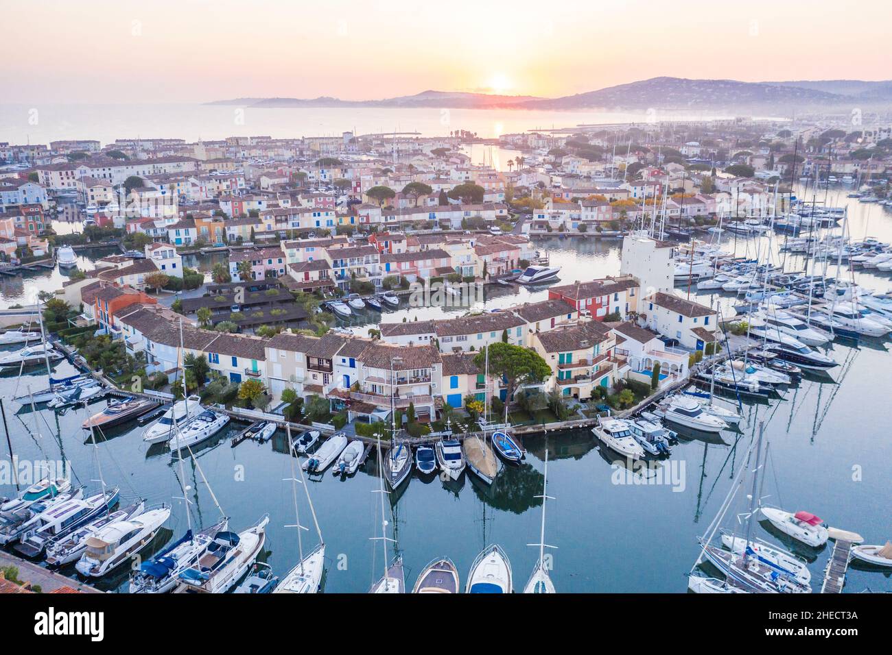 France, Var, Gulf of Saint Tropez, Grimaud, Port Grimaud, lacustrian town designed by the French architect François Spoerry, the marina (aerial view) Stock Photo