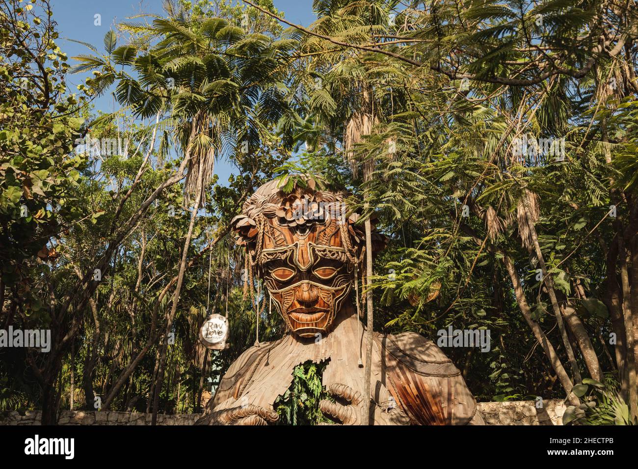 Mexico, Quintana Roo, Tulum, wooden sculpture at the entrance of the Ahau Tulum Beach hotel Stock Photo